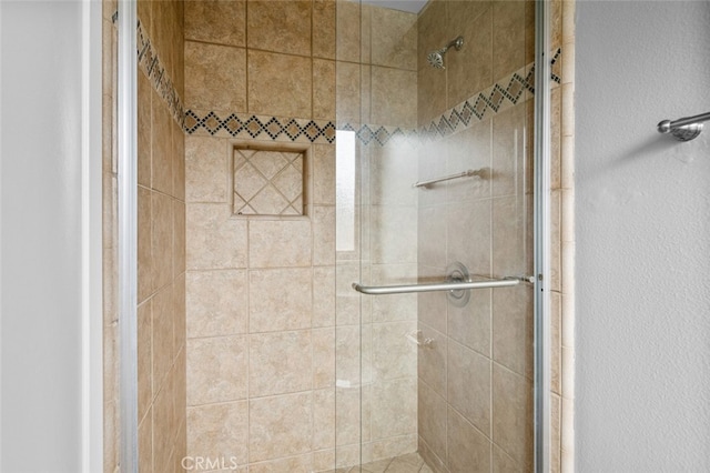 full bathroom with a shower stall