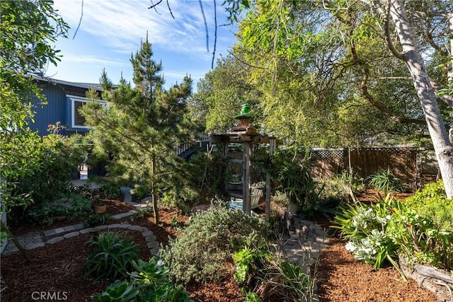 view of yard featuring fence