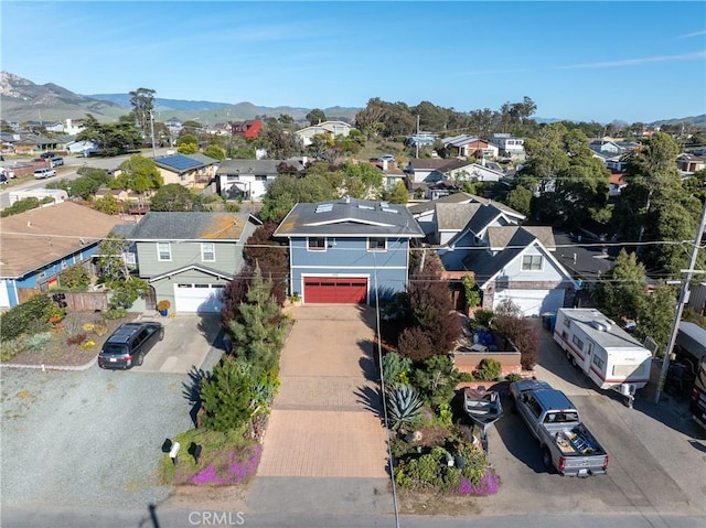 birds eye view of property featuring a residential view and a mountain view