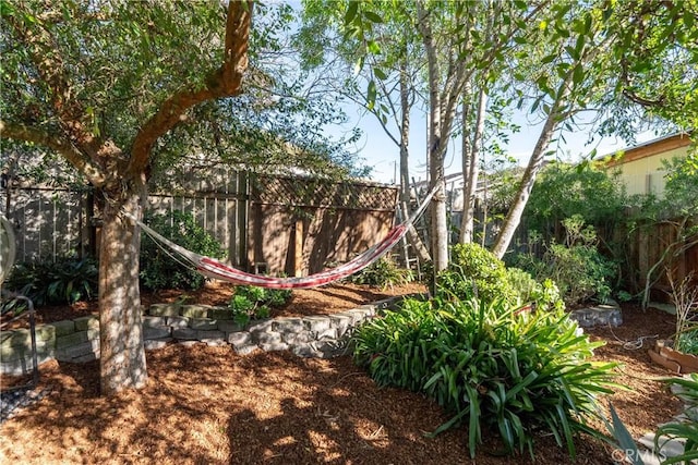 view of yard featuring fence