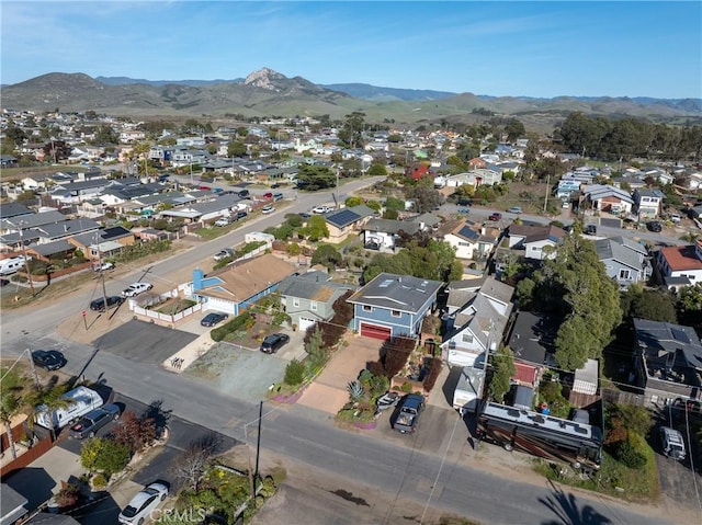 drone / aerial view with a residential view and a mountain view