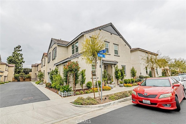 mediterranean / spanish house with stucco siding