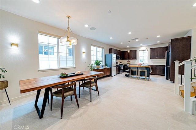 dining room featuring recessed lighting, visible vents, and baseboards