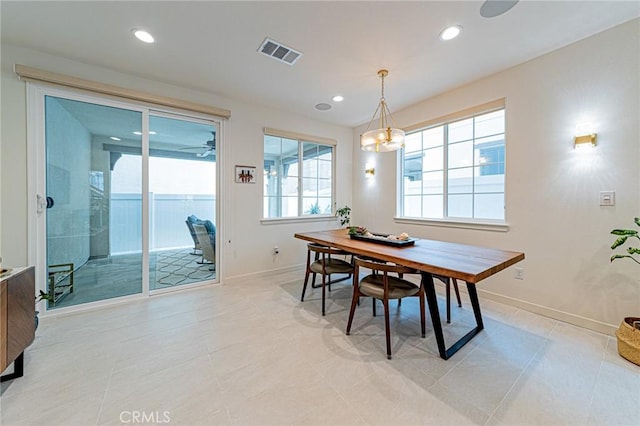 dining space with light tile patterned floors, recessed lighting, visible vents, and baseboards