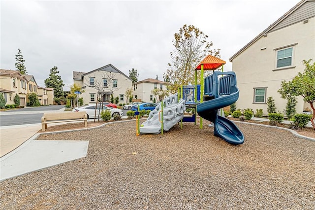 community playground featuring a residential view