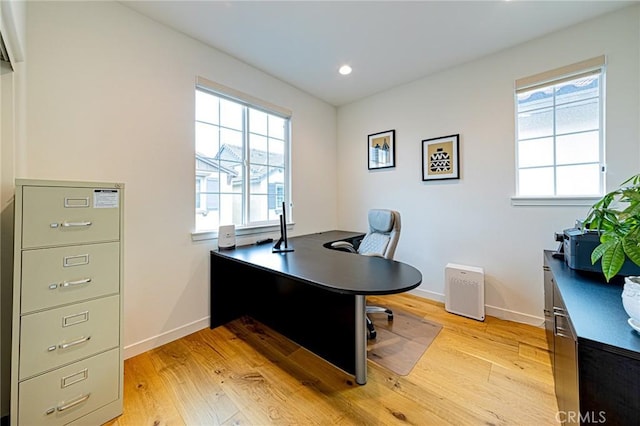 office area featuring light wood-style flooring, recessed lighting, and baseboards