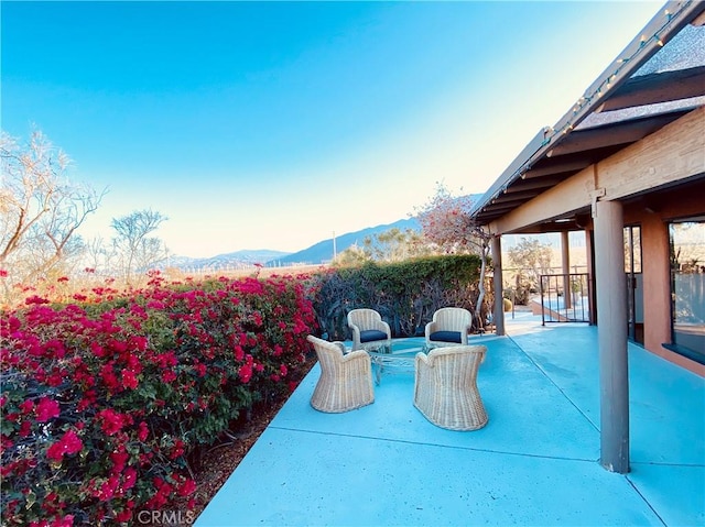 view of patio with a mountain view