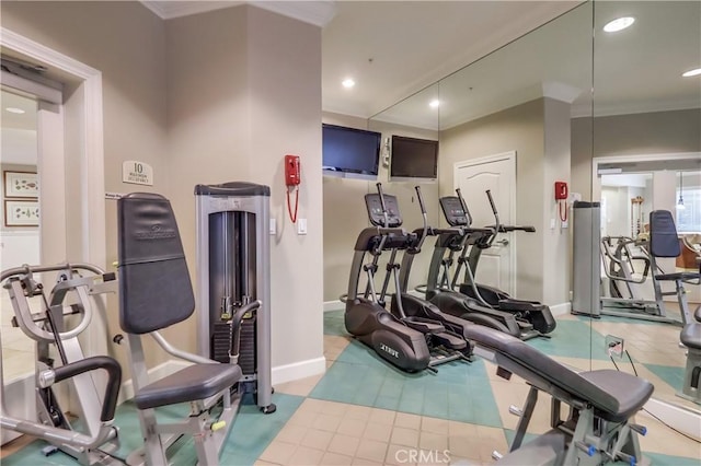 exercise room with baseboards, crown molding, and recessed lighting