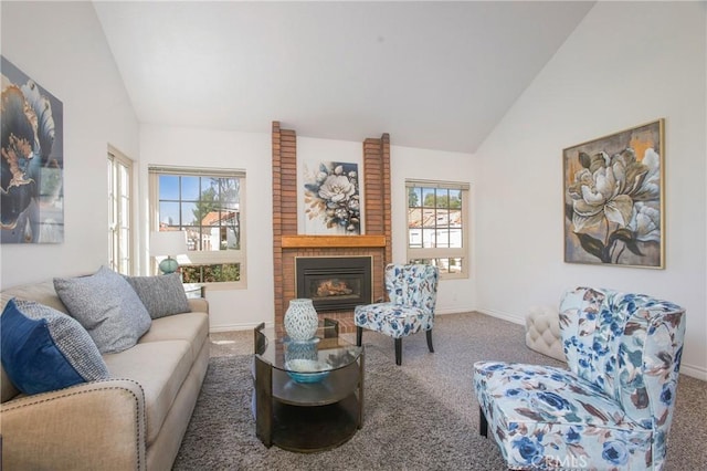 carpeted living area featuring lofted ceiling, a brick fireplace, and baseboards