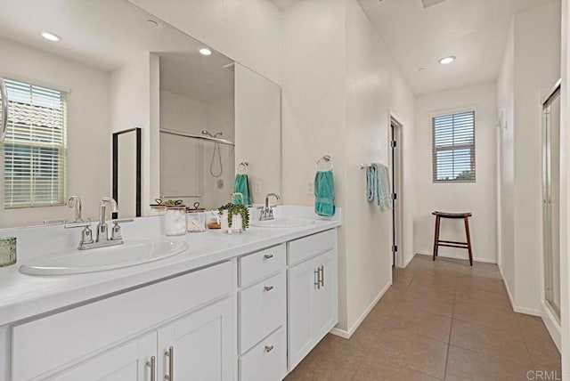 1510 Wildgrove Way, Vista, CA 92081 - bathroom featuring double vanity, a sink, a shower stall, and tile patterned floors