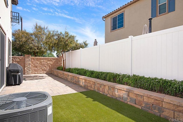 1510 Wildgrove Way, Vista, CA 92081 - view of yard with central AC, a patio area, and a fenced backyard