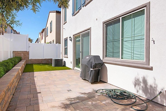 1510 Wildgrove Way, Vista, CA 92081 - view of patio / terrace featuring a fenced backyard, a grill, and central air condition unit