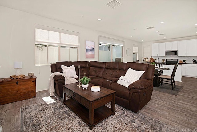 1510 Wildgrove Way, Vista, CA 92081 - living area with visible vents, wood finished floors, and recessed lighting