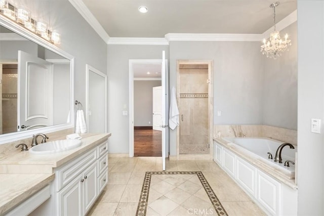 bathroom with baseboards, ornamental molding, vanity, a shower stall, and a bath