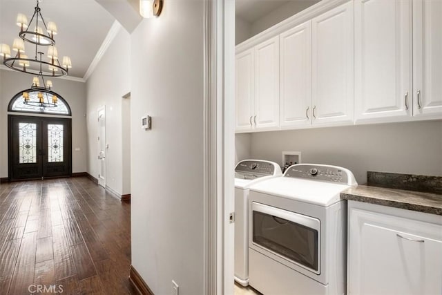 washroom featuring cabinet space, arched walkways, dark wood finished floors, crown molding, and french doors