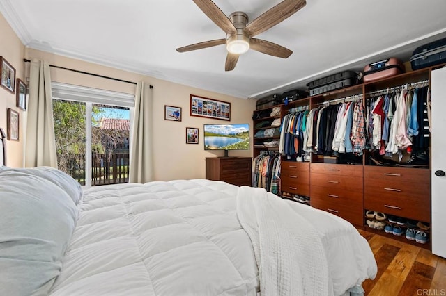 bedroom with access to exterior, ceiling fan, ornamental molding, and wood finished floors