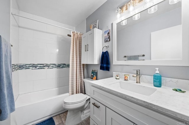 bathroom with toilet, wood finished floors, shower / tub combo with curtain, and vanity