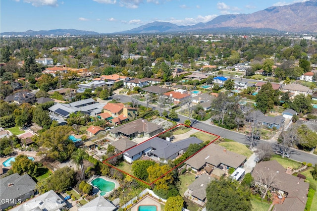 bird's eye view with a mountain view and a residential view