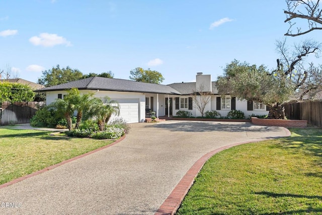 single story home featuring a front lawn, fence, stucco siding, driveway, and an attached garage