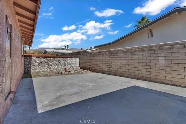 view of patio featuring a fenced backyard