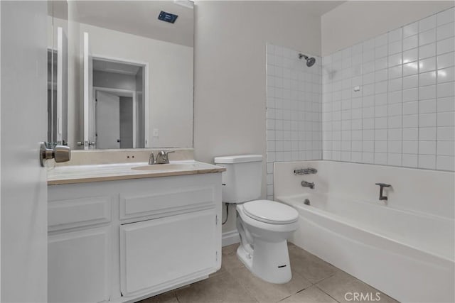 bathroom featuring shower / bathtub combination, vanity, tile patterned flooring, and toilet