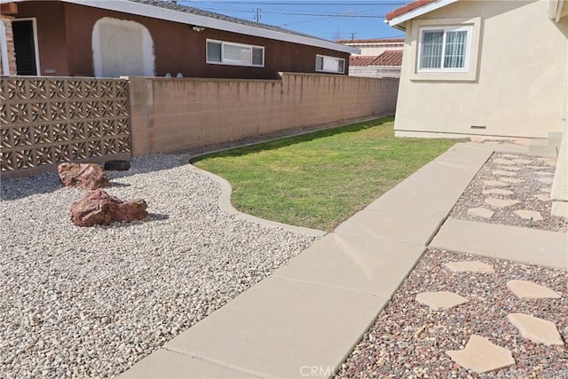 view of yard with fence