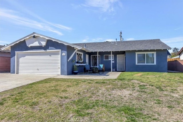 ranch-style house featuring stucco siding, concrete driveway, an attached garage, a front yard, and fence