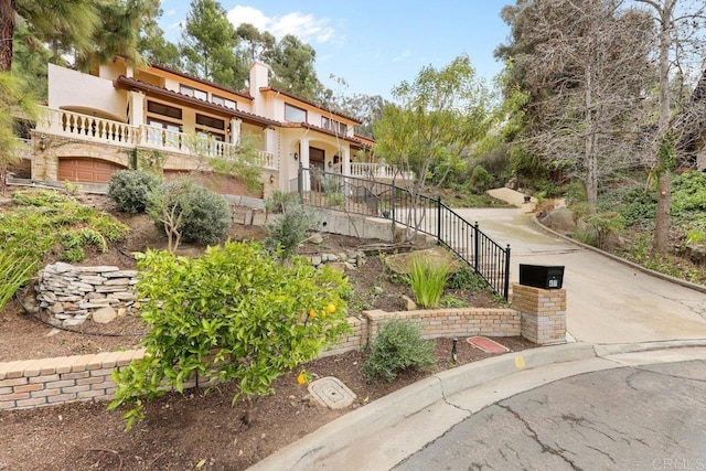 view of home's community with stairs