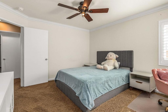 bedroom featuring ceiling fan, ornamental molding, and carpet flooring