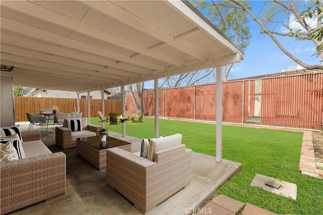 view of patio / terrace featuring a fenced backyard, an outdoor hangout area, and outdoor dining space