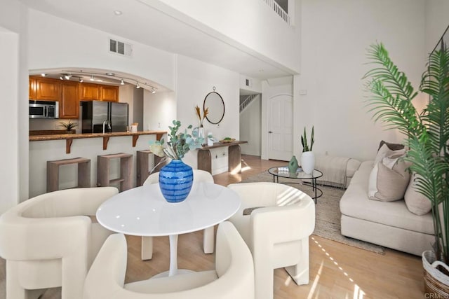 dining room featuring visible vents