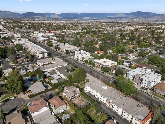 bird's eye view featuring a residential view and a mountain view