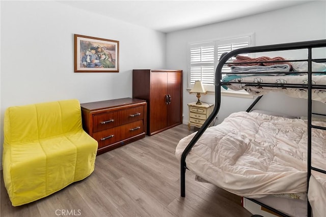 bedroom featuring light wood finished floors