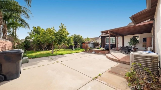 view of patio featuring central AC unit and a fenced backyard