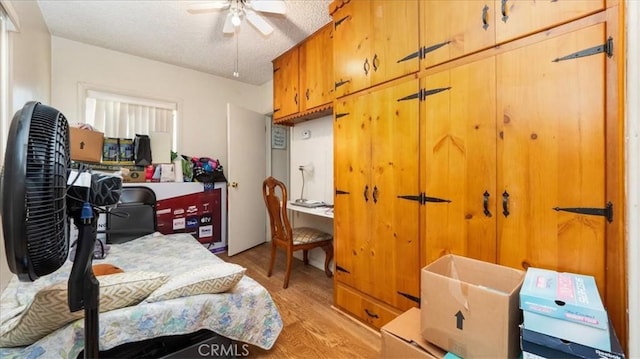 17043 Randall Ave, Fontana, CA 92335 - bedroom featuring a textured ceiling and light wood finished floors
