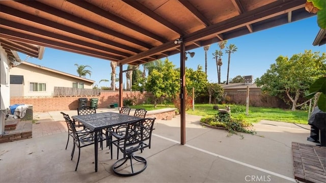 17043 Randall Ave, Fontana, CA 92335 - view of patio featuring outdoor dining area and a fenced backyard