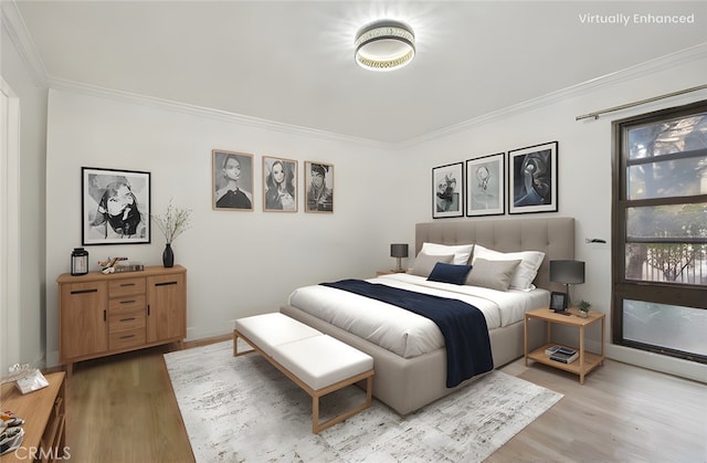 bedroom featuring light wood-type flooring, baseboards, and ornamental molding