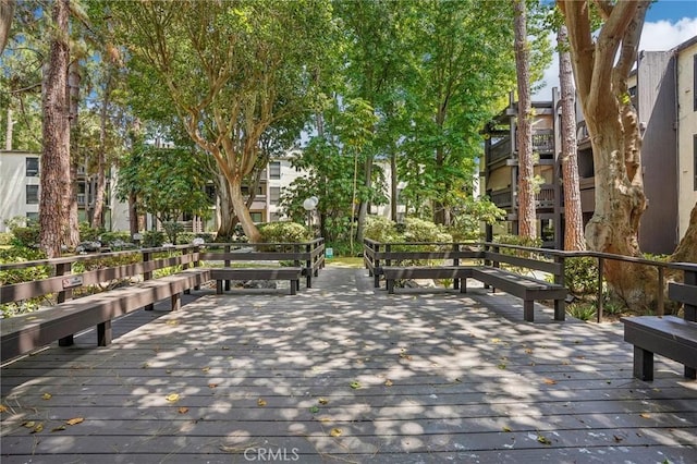 view of property's community with a wooden deck