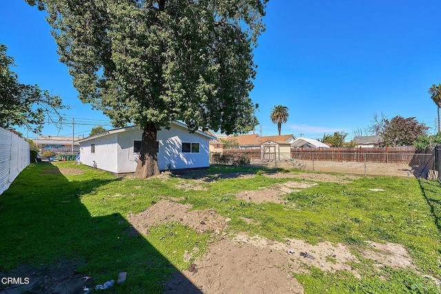 view of yard featuring a fenced backyard