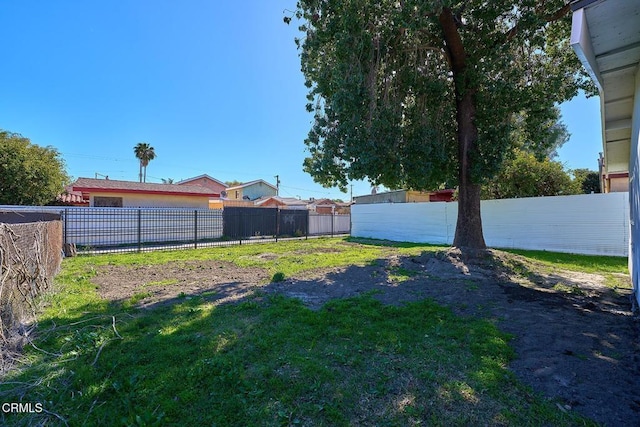 view of yard with fence