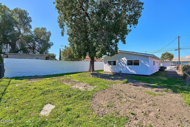 view of yard featuring fence