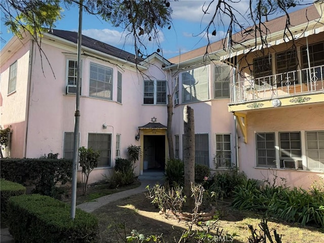 view of front of house featuring stucco siding