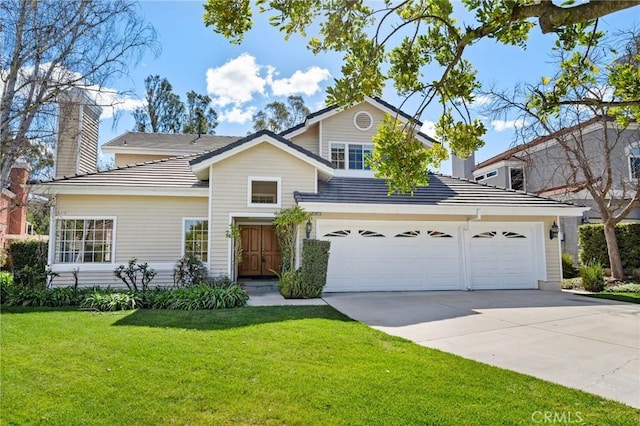 traditional-style home with a chimney, concrete driveway, and a front yard