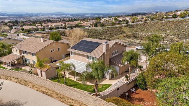 drone / aerial view with a residential view