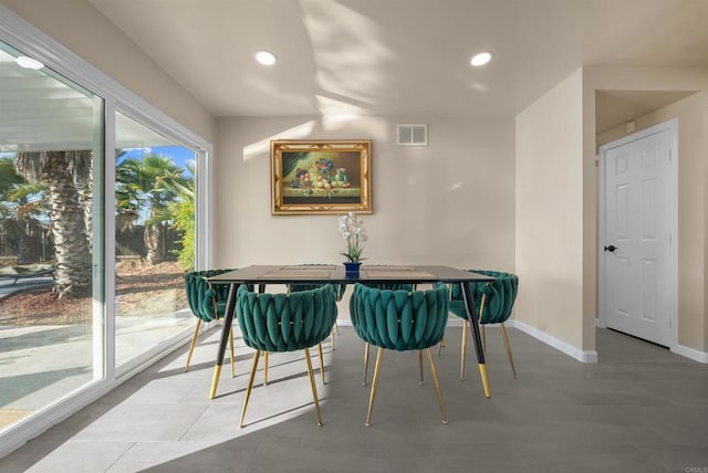 dining space featuring baseboards, visible vents, and recessed lighting