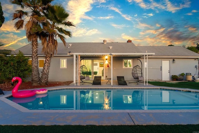 pool with a patio