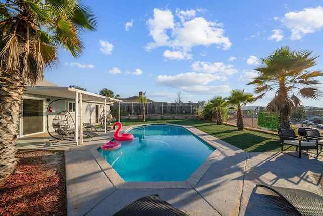 view of pool featuring a fenced in pool, a fenced backyard, and a patio