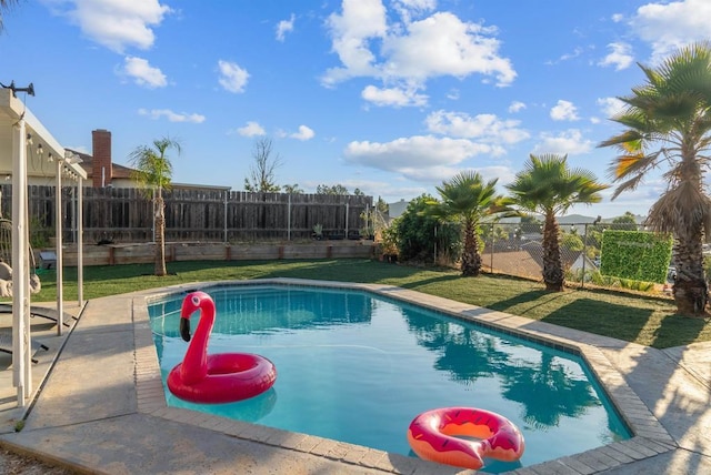 view of swimming pool with a fenced backyard and a fenced in pool