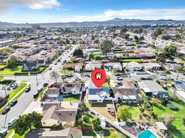 bird's eye view with a mountain view and a residential view