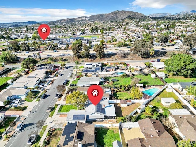 bird's eye view with a residential view and a mountain view